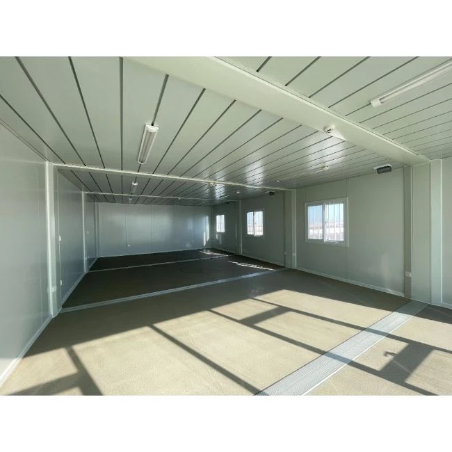 It's a prefabricated house with a large pass-through room made up of a combination of three houses